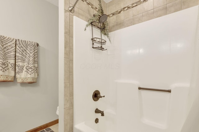 1909 Carroll Eastern Rd NW, Lancaster, OH 43130 - bathroom with bathtub / shower combination and toilet