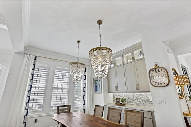 5519 Evans Farm Dr, Lewis Center, OH 43035 - dining room featuring ornamental molding and a notable chandelier