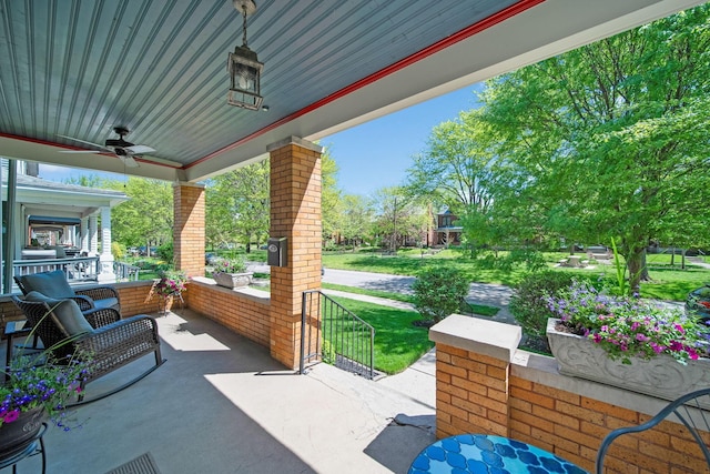 view of patio featuring a ceiling fan and covered porch