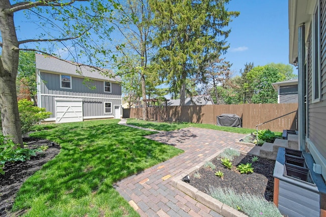 view of yard with fence private yard and a patio area