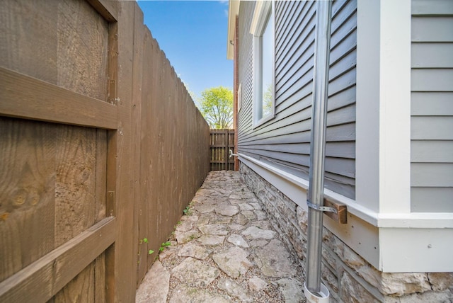 view of property exterior with fence