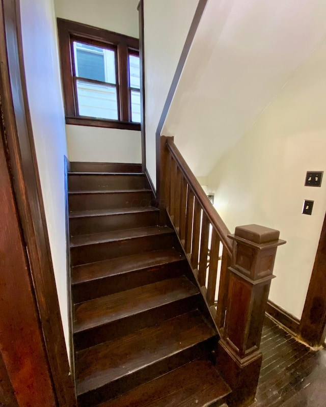 110 N Ogden Ave, Columbus, OH 43204 - staircase with hardwood / wood-style floors and baseboards