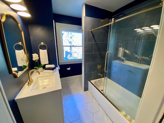 110 N Ogden Ave, Columbus, OH 43204 - bathroom with vanity, shower / washtub combination, and tile patterned floors