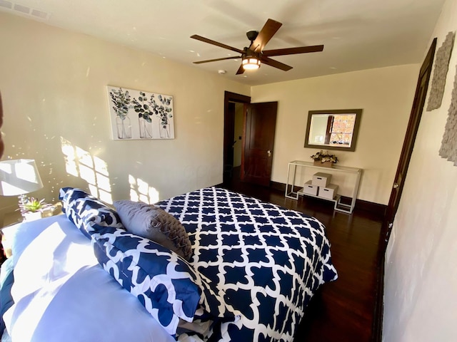 110 N Ogden Ave, Columbus, OH 43204 - bedroom with visible vents, wood finished floors, and a ceiling fan