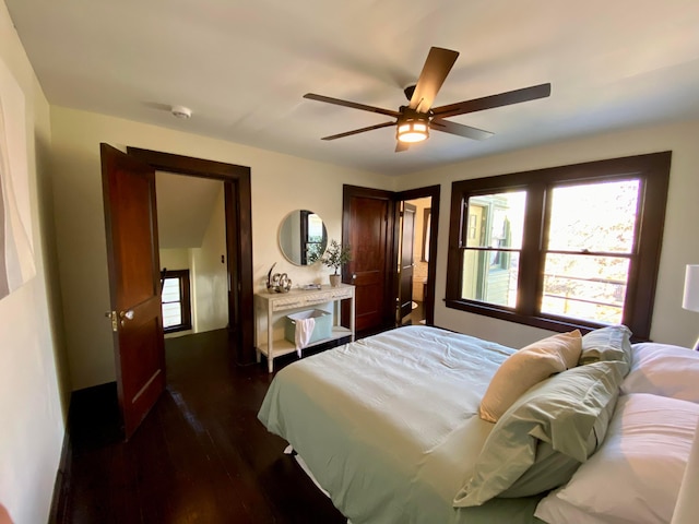 110 N Ogden Ave, Columbus, OH 43204 - bedroom with dark wood-style floors, a ceiling fan, and multiple windows