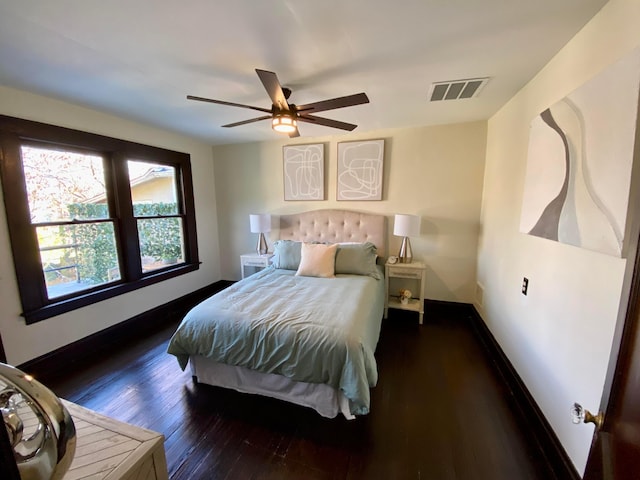 110 N Ogden Ave, Columbus, OH 43204 - bedroom with baseboards, visible vents, wood finished floors, and a ceiling fan