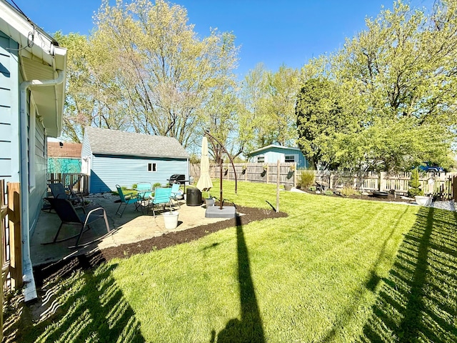view of yard featuring a fenced backyard and a patio area