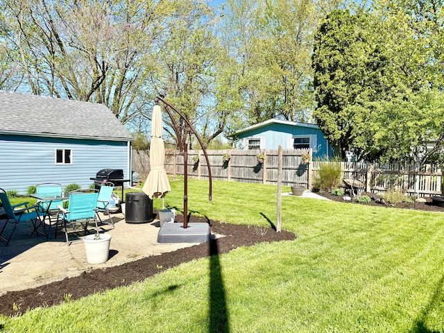 view of yard with a patio and fence private yard