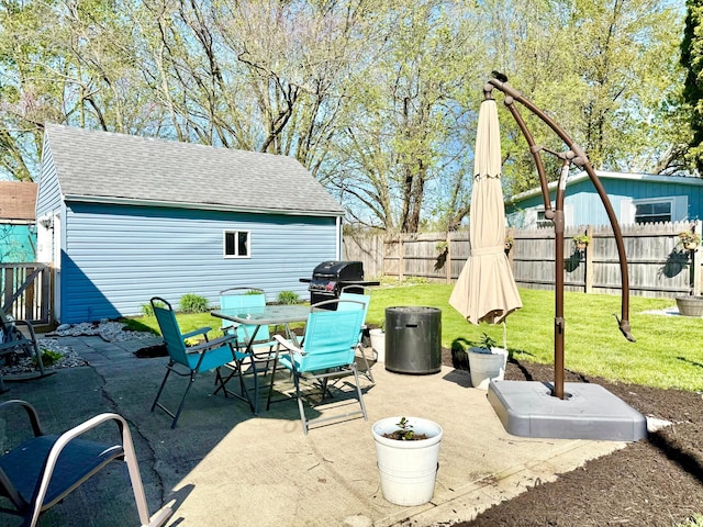 view of patio / terrace featuring outdoor dining space and a fenced backyard
