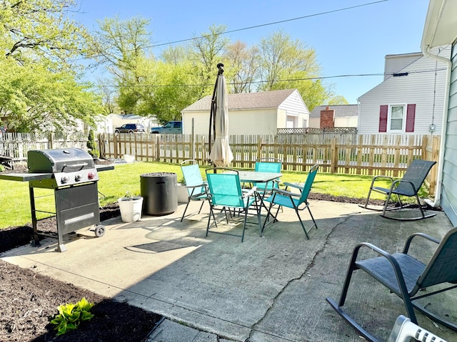 view of patio / terrace featuring outdoor dining space, area for grilling, and a fenced backyard