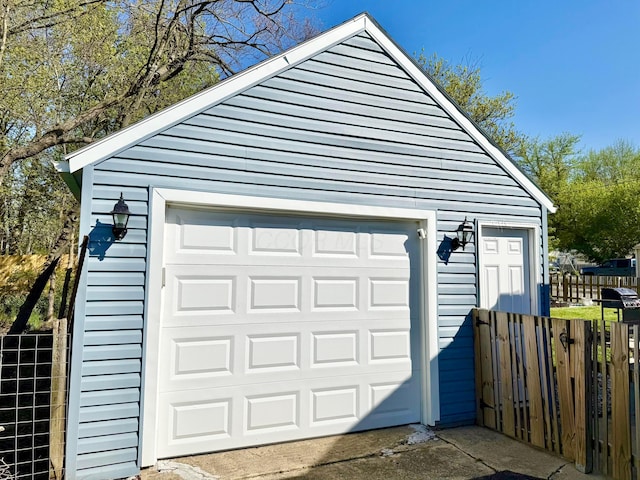 detached garage with fence