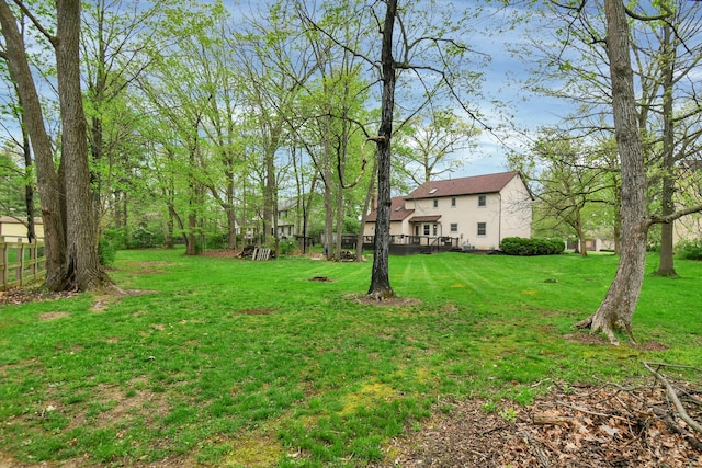 view of yard featuring a wooden deck