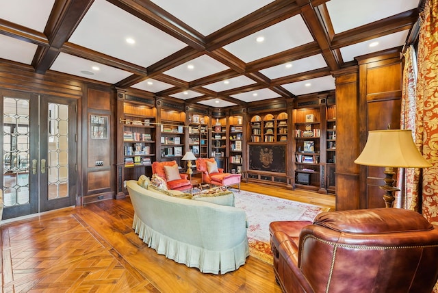 living area with beam ceiling, parquet floors, built in features, recessed lighting, and coffered ceiling