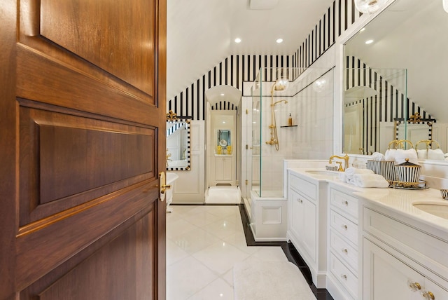 bathroom featuring double vanity, recessed lighting, tile patterned floors, a shower stall, and a sink