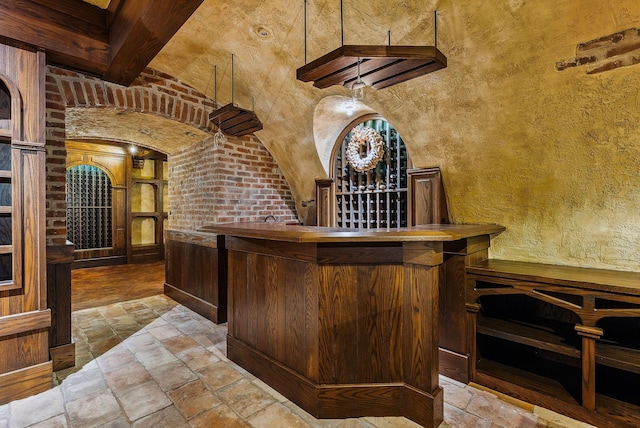 wine room featuring stone tile floors