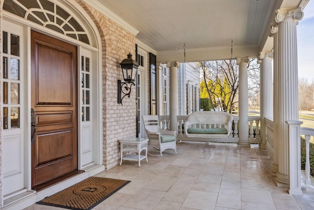 property entrance featuring a porch