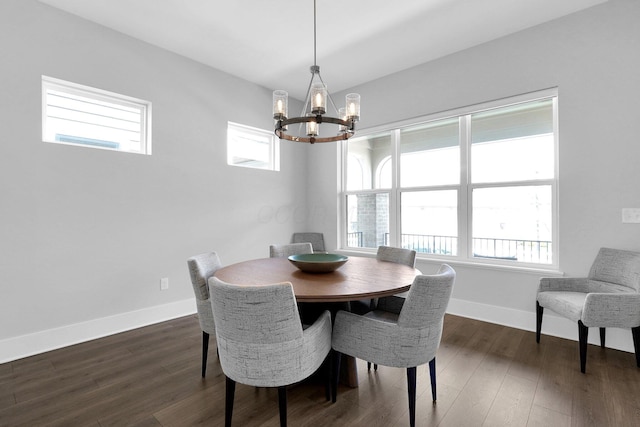 935 Pullman Pl, Columbus, OH 43212 - dining room with dark wood-style flooring, a notable chandelier, and a healthy amount of sunlight