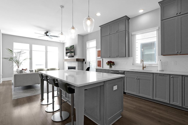 935 Pullman Pl, Columbus, OH 43212 - kitchen with a sink, gray cabinets, ceiling fan, and open floor plan
