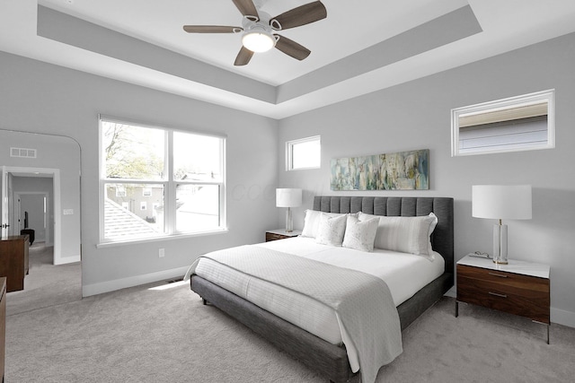 935 Pullman Pl, Columbus, OH 43212 - bedroom with baseboards, carpet, a tray ceiling, and visible vents