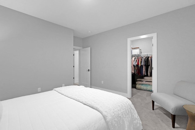 935 Pullman Pl, Columbus, OH 43212 - bedroom featuring light colored carpet, a spacious closet, and a closet