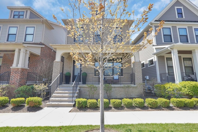 935 Pullman Pl, Columbus, OH 43212 - traditional style home with a porch and brick siding