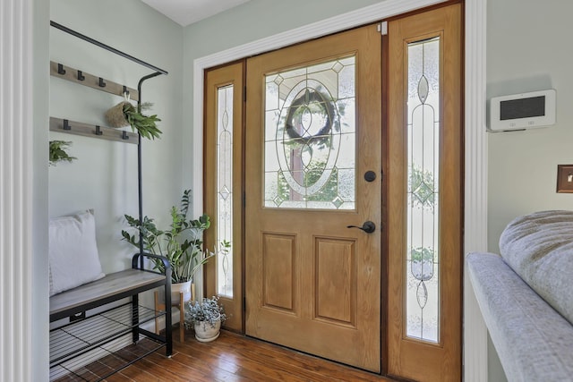 foyer with dark wood-style floors