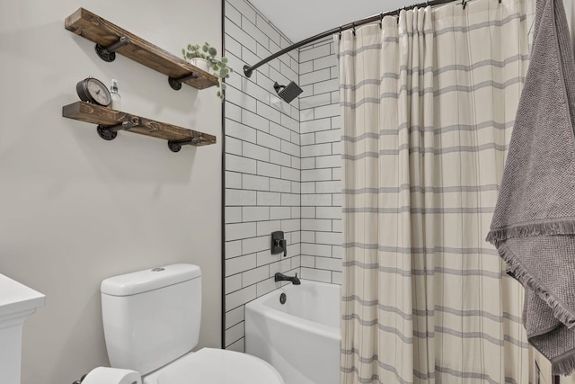 bathroom with shower / tub combo and toilet