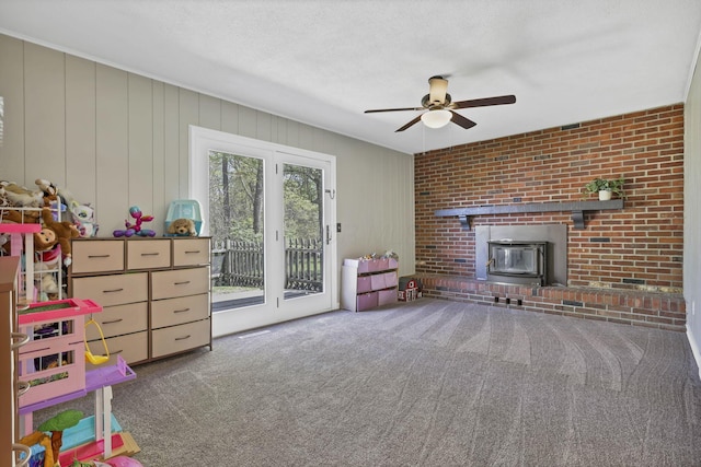 interior space featuring carpet and ceiling fan