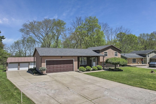 split level home with a front yard, stucco siding, a shingled roof, concrete driveway, and an attached garage