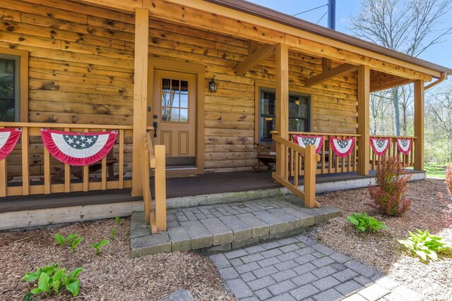 property entrance with a porch