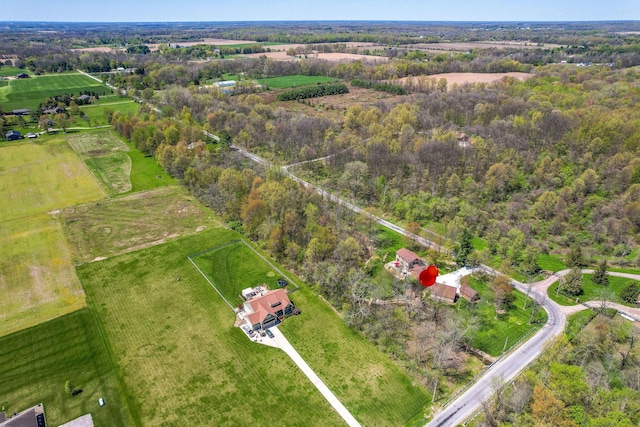 birds eye view of property featuring a rural view