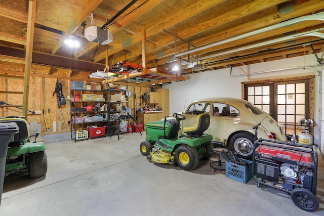 garage featuring french doors and a garage door opener