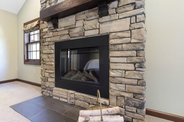 interior details featuring baseboards and carpet