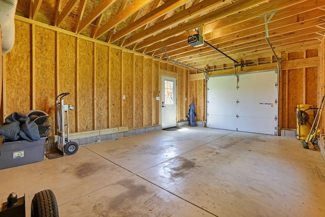 garage featuring a garage door opener