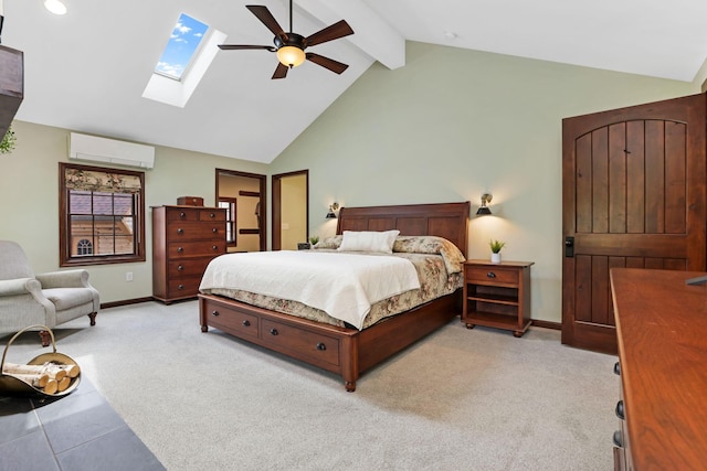 bedroom featuring a wall unit AC, a skylight, beam ceiling, baseboards, and light carpet