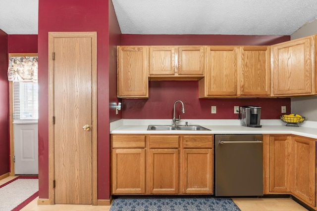 1111 Viewpointe Dr, Columbus, OH 43207 - kitchen with a sink, dishwasher, light countertops, and a textured ceiling