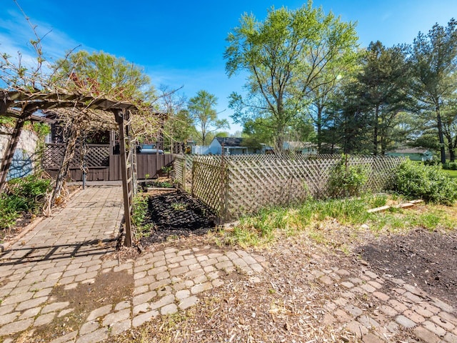 view of yard with a gate and a fenced front yard