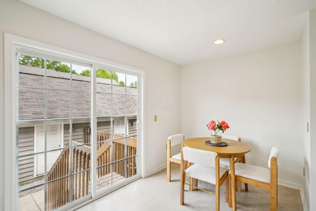 3857 Dowitcher Ln, Columbus, OH 43230 - dining room featuring baseboards, recessed lighting, and tile patterned floors