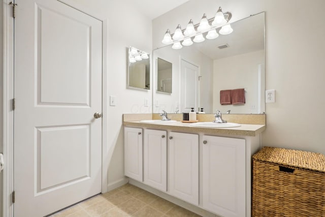 3857 Dowitcher Ln, Columbus, OH 43230 - bathroom with double vanity and tile patterned flooring