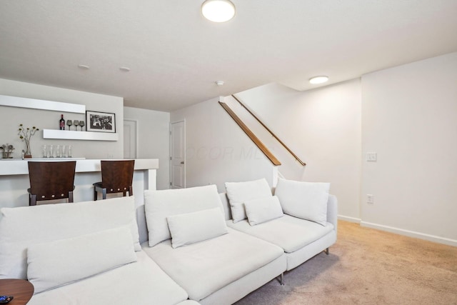 3857 Dowitcher Ln, Columbus, OH 43230 - living room featuring light carpet, bar, and baseboards