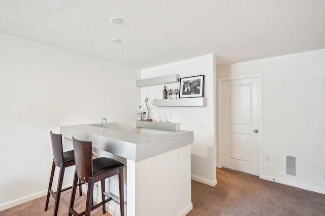 3857 Dowitcher Ln, Columbus, OH 43230 - bar area featuring carpet and baseboards