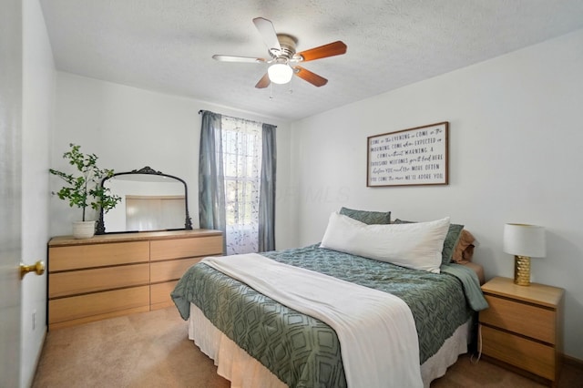 5694 Danmar Dr, Canal Winchester, OH 43110 - carpeted bedroom featuring ceiling fan and a textured ceiling