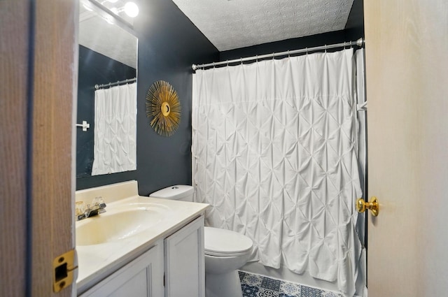 5694 Danmar Dr, Canal Winchester, OH 43110 - bathroom featuring vanity, toilet, and a textured ceiling