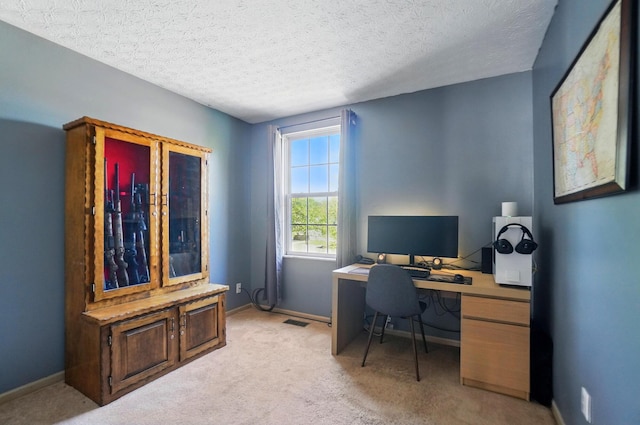 5694 Danmar Dr, Canal Winchester, OH 43110 - home office featuring baseboards, light carpet, and a textured ceiling