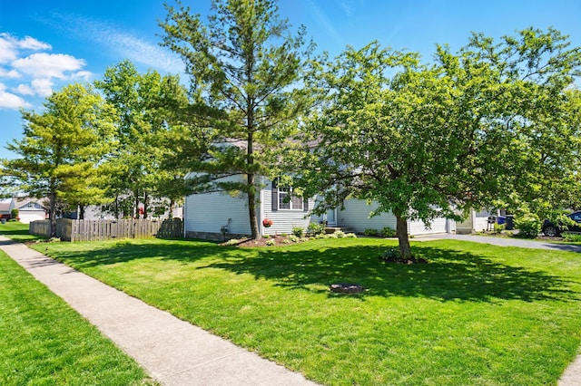 5694 Danmar Dr, Canal Winchester, OH 43110 - view of front of house with driveway and a garage