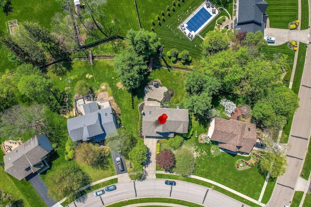 birds eye view of property with a residential view