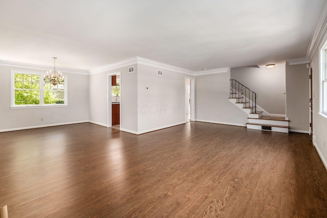 unfurnished living room with baseboards, dark wood-style floors, stairs, and a chandelier