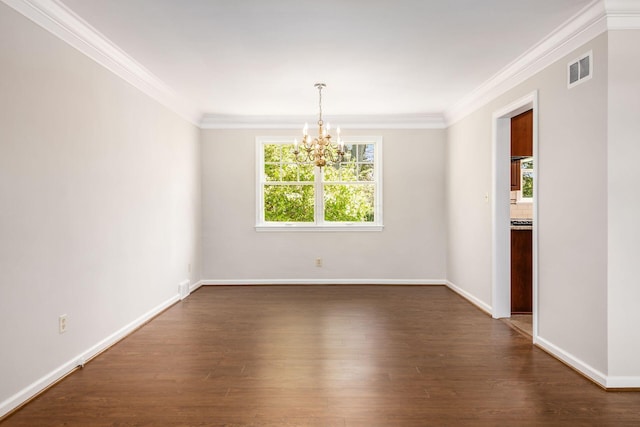empty room featuring visible vents, ornamental molding, dark wood-type flooring, and a chandelier