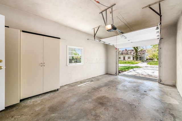 garage featuring a garage door opener