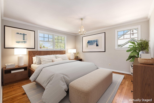 bedroom with an inviting chandelier and crown molding